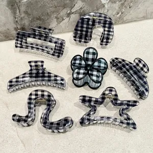Set di mollette per capelli a quadri bianco e nero, forme carine per capelli folti dettaglio.