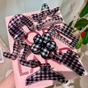 Grande set di mollette per capelli a quadretti bianchi e neri, forme geometriche donna.