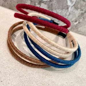 Detailed view of double-strand yarn wrapped headbands, stylish thin double layer hair hoops.
