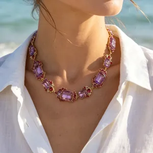 Close-up detail of vintage baroque palace style purple crystal rhinestone necklace.