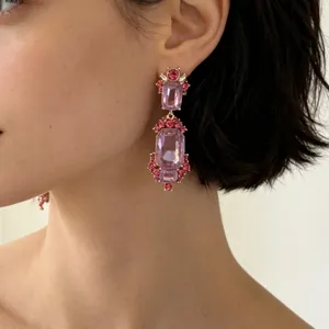 Vintage court style crystal earrings featuring purple stones and pink rhinestones for women.