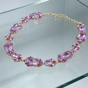 Close-up detail of vintage court style crystal necklace, showing exquisite gemstone crafts.