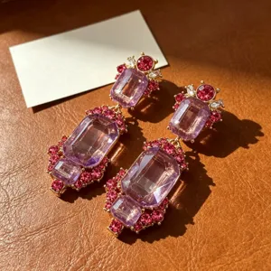 Vintage court style crystal dangle earrings with purple and pink rhinestones for women.