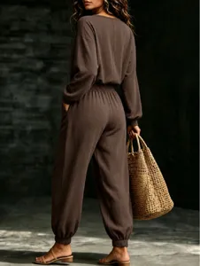 Detail view of women casual long sleeve top and lantern jogger pants set in brown color.