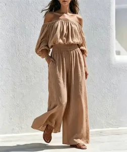Casual beige off-shoulder top and wide leg linen pants set, elegant women outfit detail view.