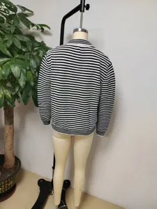 Black and white striped knitted cardigan sweater for women, casual long sleeve outerwear.