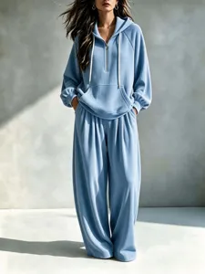 Casual effen kleur hoodie met rits en wijde broek trainingspak set voor dames detail weergave