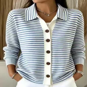 Blue and white striped knit cardigan with buttons, detailed view of texture and buttons.