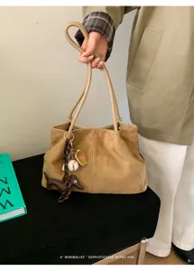 Vintage suede tote bag for women, casual shoulder bag with cute charms and retro design.
