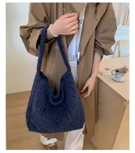 Detailed view of the fuzzy wool shoulder bag in dark blue, perfect for casual daily wear.
