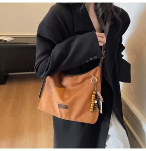 Sac cabas en suédine rétro décontracté pour femme, sac porté épaule tendance et sac bandoulière.