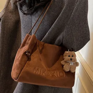 Retro suede shoulder bag for women, large capacity casual tote bag, vintage commuter hobo bag.