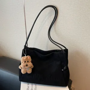 Black suede retro women tote bag, large capacity casual commuting shoulder bag with charm.