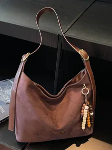 Sac épaule hobo en daim marron vintage pour femmes sac de banlieue mode casual sous les aisselles.