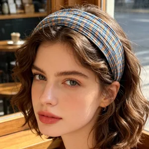 Detailed view of the Korean pleat plaid wide headband, stylish colorblock hair hoop detail.