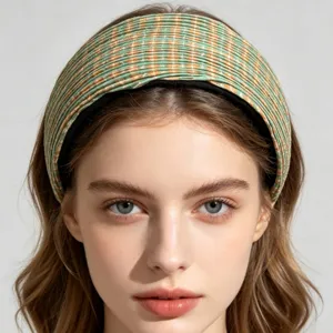 Green and orange pleated plaid wide headband detail, comfortable hair accessory for women.