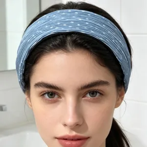 Blue pleated polka dot wide headband, stylish hair accessory for women detail view.