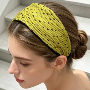 Close-up detail of the Korean style pleated polka dot wide headband, showcasing texture.