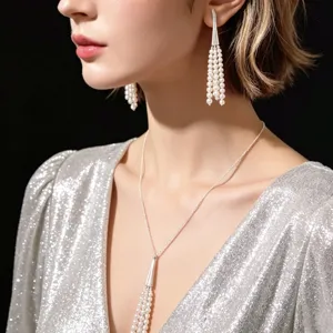 Elegant pearl tassel necklace and earrings set for women, long chic sweater chain jewelry.