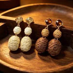 Retro bohemian crystal and woven twine drop earrings, unique natural style jewelry detail.