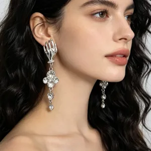 French vintage surrealist hand crystal drop earrings long tassel luxury jewelry detail shot