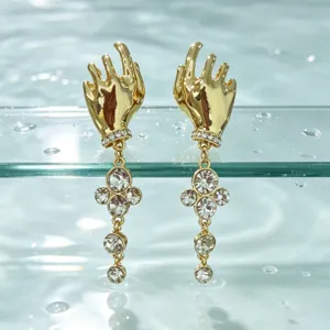 French vintage artistic gold hand shape earrings with sparkling rhinestones and delicate tassel drops.
