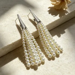 Long pearl tassel earrings with crystal cone top, elegant vintage drop earrings for women.