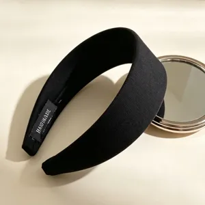 Classic black wide fabric headband for women, elegant vintage daily hair accessory piece.