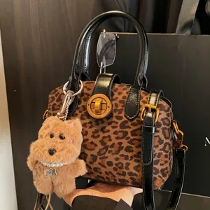 Chic leopard print women handbag with cute plush bear charm, stylish shoulder bag, new.