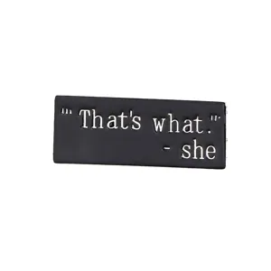 Minimalist black metal brooch pin with funny English quote text, trendy streetwear style.