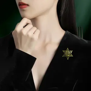Gold tone metal sheriff star brooch badge for women fashion apparel accessories.