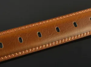 Men's leather belt detail view, brown cowhide material with double stitching and neat punch holes.