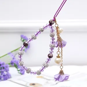 Cordón de teléfono móvil morado creativo correa de muñeca corta con pedrería perlas flor borla