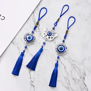 Türkischer blauer böser Blick Quasten hängende Dekoration Set mit Herz und Metall Anhängern.