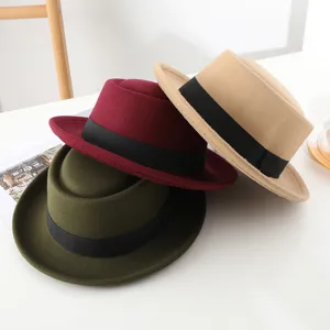 Classic woolen flat top jazz hat with black ribbon, elegant British style pork pie hat.