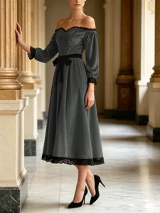 Elegant velvet midi dress detail, off-shoulder design, black lace trim and waist bow.