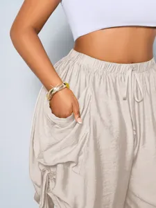 High-waist loose cotton linen harem shorts with drawstring and large pockets for women.