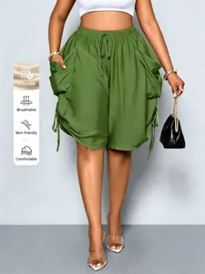 Women high-waist loose harem shorts with large pockets and stylish drawstring detail view.