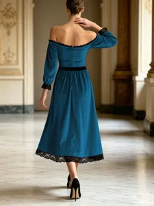 Detail view of the elegant blue velvet dress featuring exquisite black lace trim and back design.