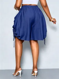 Back view detail of women high waist loose balloon harem shorts with side drawstring design.
