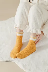 Fluffy coral fleece sleep socks for women, warm winter cozy home floor socks with striped cuff.