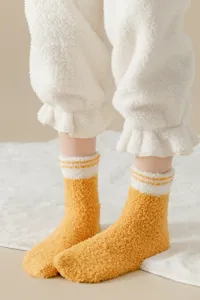 Fluffy coral fleece sleep socks for women, warm winter thermal floor socks with stripes.
