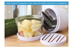 Detail view of manual garlic chopper transparent container and stainless steel blades.