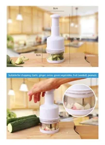 Handheld manual press vegetable chopper and garlic grinder for kitchen food prep easy.