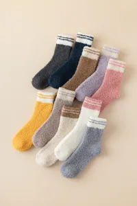 Soft fuzzy coral fleece sleep socks detail, warm winter thermal floor socks for women.