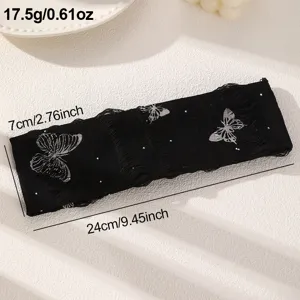 Bandeau large noir avec broderie de papillon argenté et détails de franges, vue détaillée.