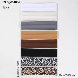 8pcs solid and leopard print athletic headbands detail, showing size, weight, and texture.