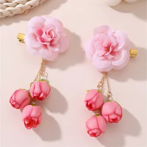 Pink fabric flower hair clip with hanging chains, sweet Chinese style floral hairpin detail.
