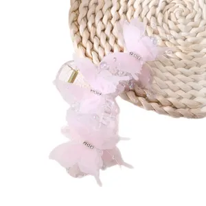 Elegant pink mesh butterfly hair claw clip for women, large fashion shark clip accessory.