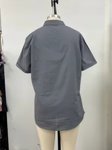 Detail view of men's short sleeve grey casual button-up shirt showing back fit.